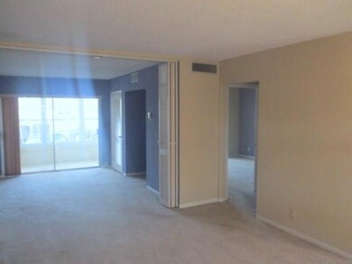 Open living area to convertible bedroom