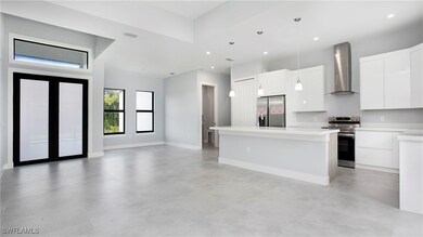 Kitchen featuring appliances with stainless steel