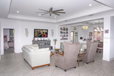 Great Room with coffered ceilings and recessed lig