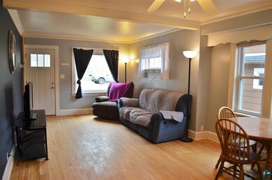 Has a beautiful large picture window and hardwood 