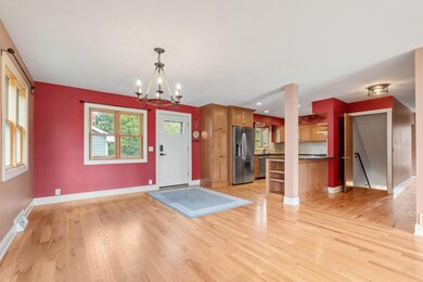 Open floorpan between kitchen, dining, living room