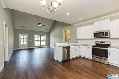 Features gorgeous Granite, Backsplash, Stainless A
