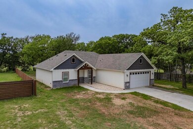 View of front of property with fence, a front lawn