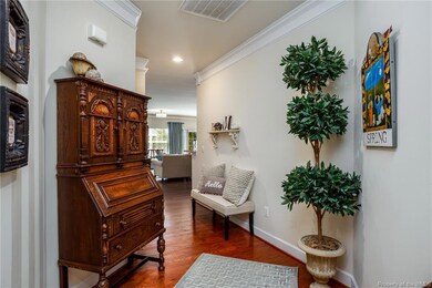Wide Entry Foyer with extended crown molding, hard
