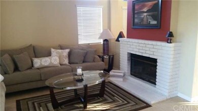 Living Room with fireplace with gas or firewood