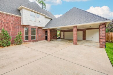Up close view of covered parking, covered side home access, and gated pool entry.