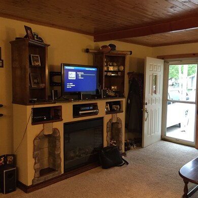 Living Room and Entertainment center that stays wi