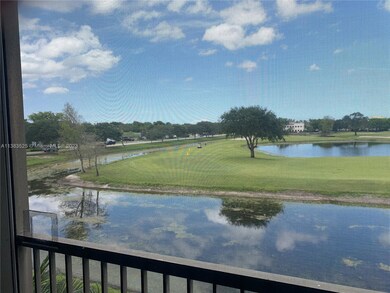 SCREENED PORCH OVERLOOKS LAKE AND PRACTICE AREA.