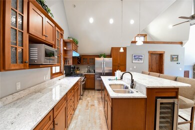 Kitchen with wine cooler, appliances with stainles