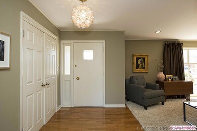Appealing entry with engineered wood floors, updat