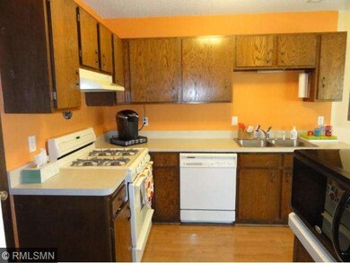 Corner-style kitchen configuration with gas range,