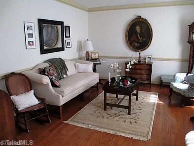 Living Room. Lots of HW floors in this home...this would also be a wonderful home office, library or music room.