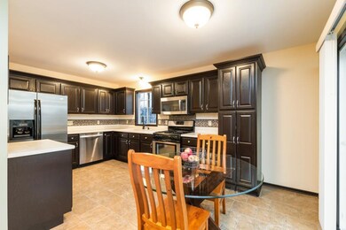 Decorative back splash compliments the rich color 