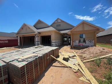 Unfinished property featuring roof with shingles and board and batten siding
