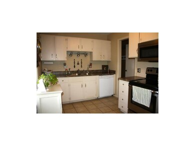 Kitchen with tile flooring