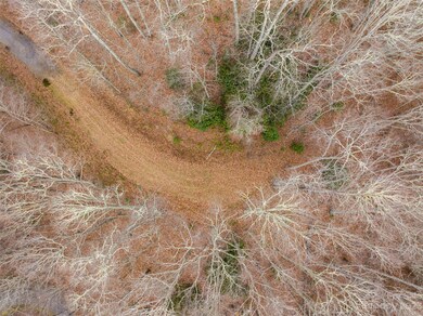 Aerial of graded build site and driveway