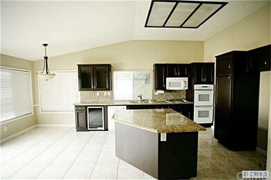 Family room opens up into the Kitchen