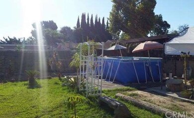 2nd third of back lot with pool and yard area