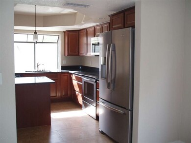 Looking into kitchen from formal dining