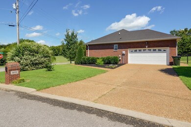 2 car garage is nicely tucked to the side