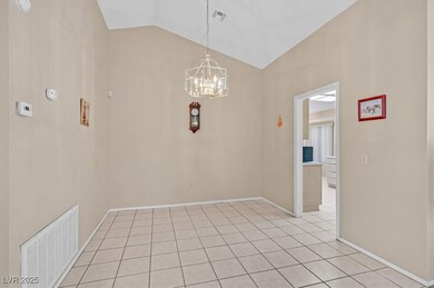 Dining area featuring an inviting chandelier, ligh
