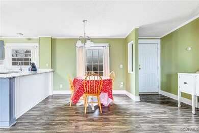 Dining room featuring an inviting chandelier, crow