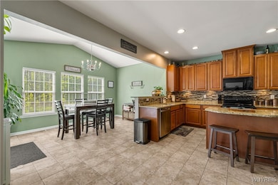 Spacious kitchen with an island & breakfast bar