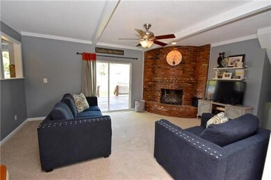 Family Room with Brick Gas Fireplace
