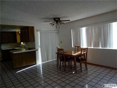 Dining area with sliding doors to outside patio