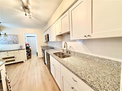 Big kitchen remodeled (2024) to include granite countertops and stainless-steel appliances (2024),