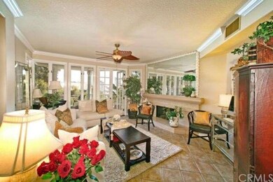 Spacious Living Room with Travertine marble firepl