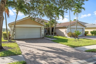 Ranch-style home with a garage and a front yard