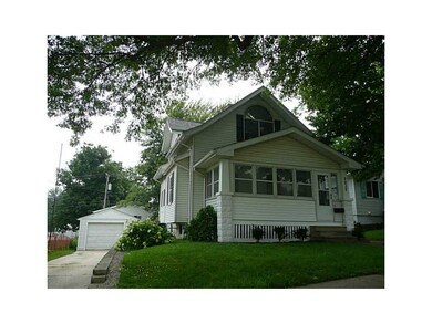 Front Exterior. Newer concrete drive leading to de