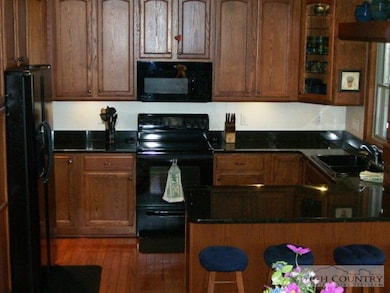 The kitchen boasts a great floorplan, abundant cab