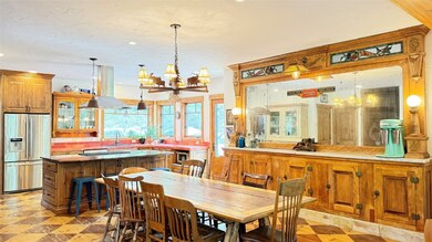Dining area with extra long table and an antique s