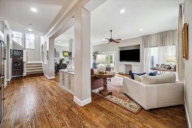 Gallery and open living room with double sided fir
