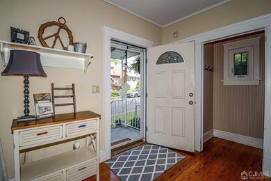 Upgraded front door opens to large Formal Living r