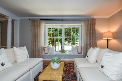 formal Living room with bay window / seat and hard