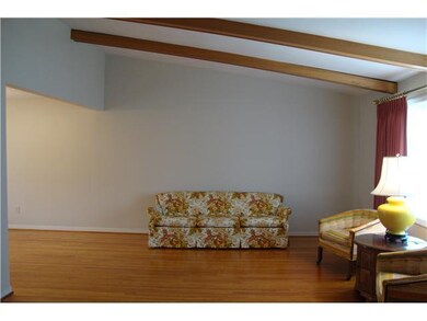 Living Room Open Floor plan, beamed ceiling, brigh