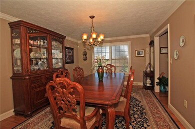 The formal dining room is a great size and just pe