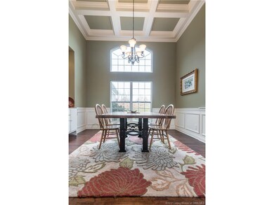 Coffered Ceiling and Wainscoting show off this din