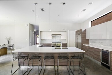 Gather around the central hub of the home at the s