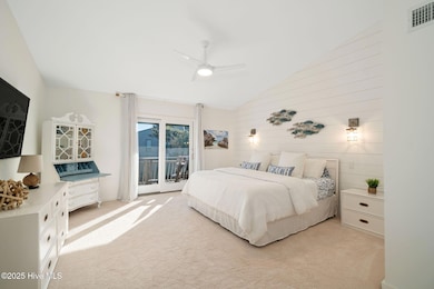 Primary bedroom suite w/ private deck