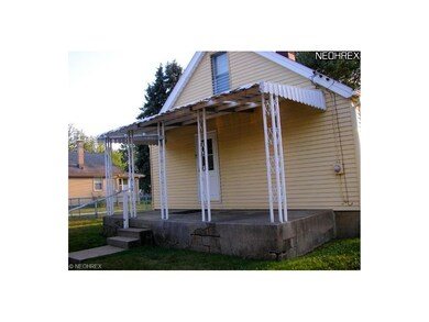 Covered back porch and fenced yard