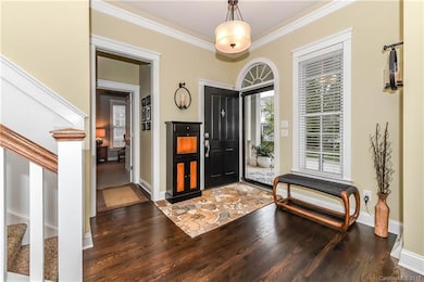 Foyer with newly refinished hardwood floors
