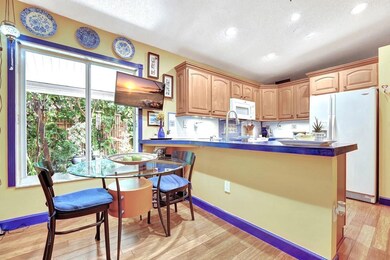 The colorful, cozy kitchen will make you feel like