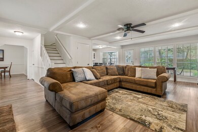 Located on a corner lot, this home has a three car