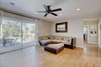 Open living room with a large sliding door leading