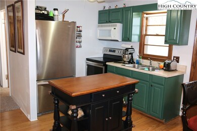Kitchen area - the island can stay with the home.
