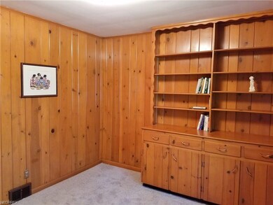 Bedroom 3 with built-in shelving and cabinets coul